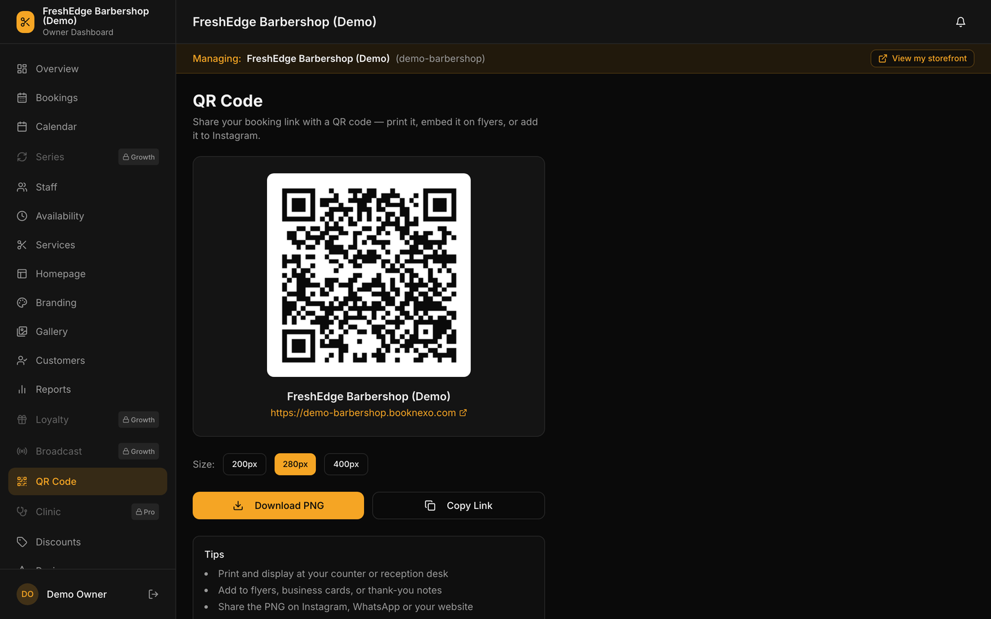 The QR code screen, showing a generated code for the shop's booking page alongside the link, ready to download and print.